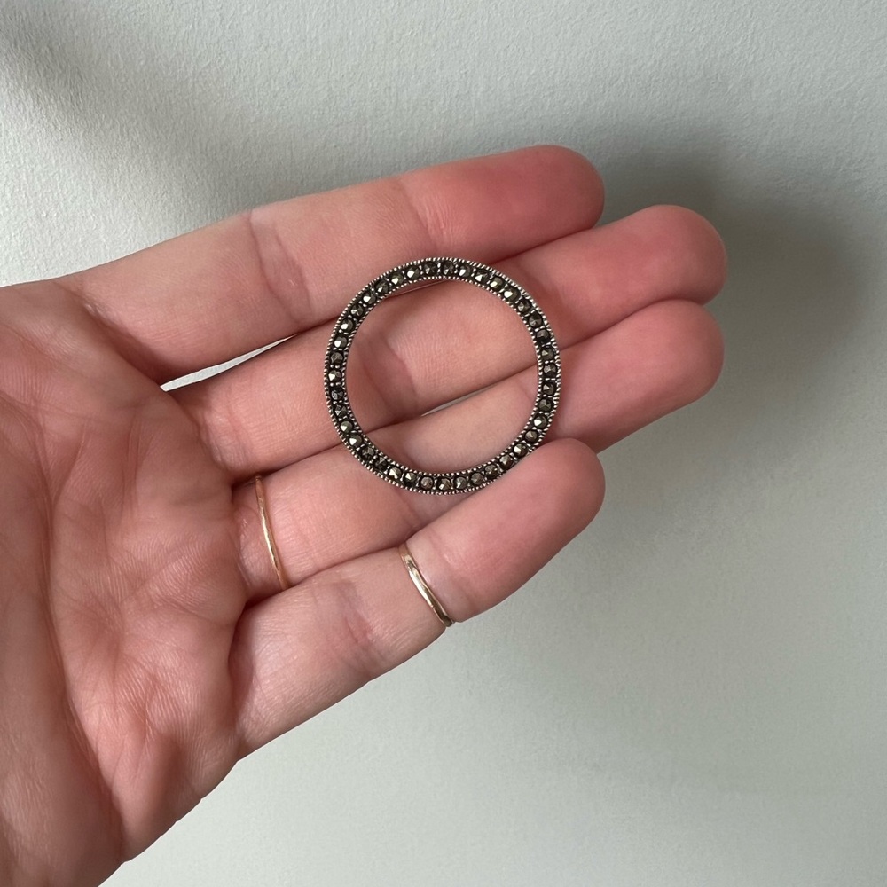 Elegant Silver Circular Pendant